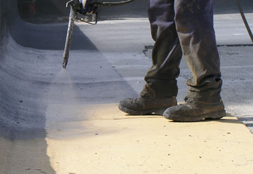 coating systems over Olathe spray foam roof systems